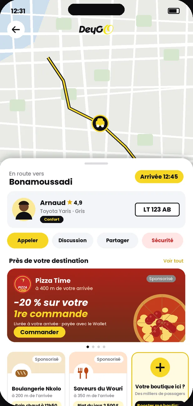 Écran de course DeyGo pendant le trajet : destination et heure d'arrivée, puis offres sponsorisées de commerces proches de l'arrivée